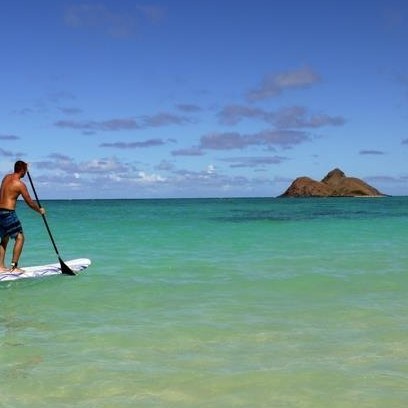 man paddle boarding